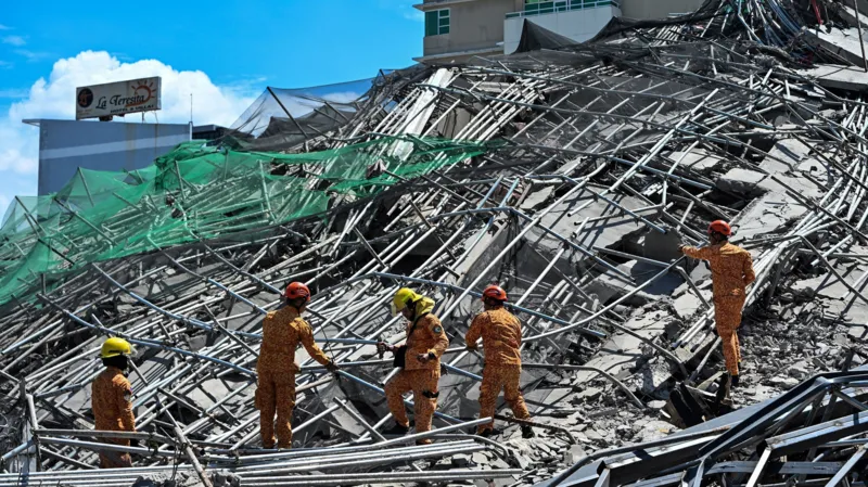 Building Collapse Near Philippine Capital Leaves Workers Trapped Under Rubble