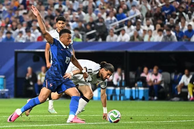 France 3-0 Iraq: Mbappe Shines Through the Storm to Keep Messi's Record in Sight