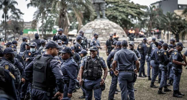 Members of the South African Police Service SAPS gather ahead of planned demonstrations by the Mar
